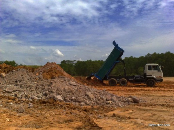 hundreds of load of soil for the start hill and turn 1